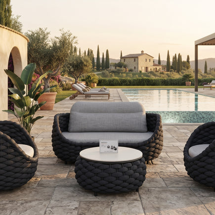 Modern Grey Woven Rope 4-Piece Outdoor Patio Conversation Set in a styled outdoor living room