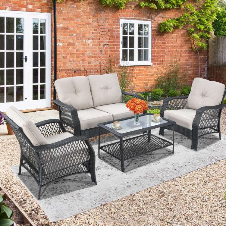 Costway 4 Pieces Patio Wicker Furniture Set with Coffee Table and Cushions - Majic Backyard