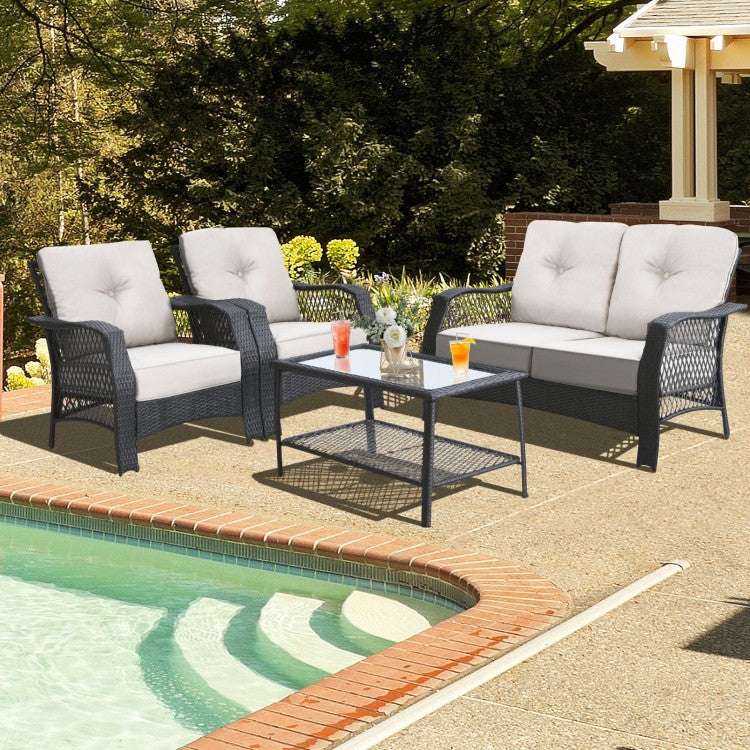 Costway 4 Pieces Patio Wicker Furniture Set with Coffee Table and Cushions - Majic Backyard